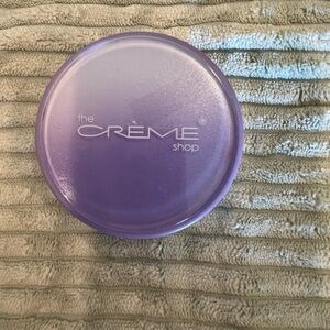The Crème Shop purple color correcting primer